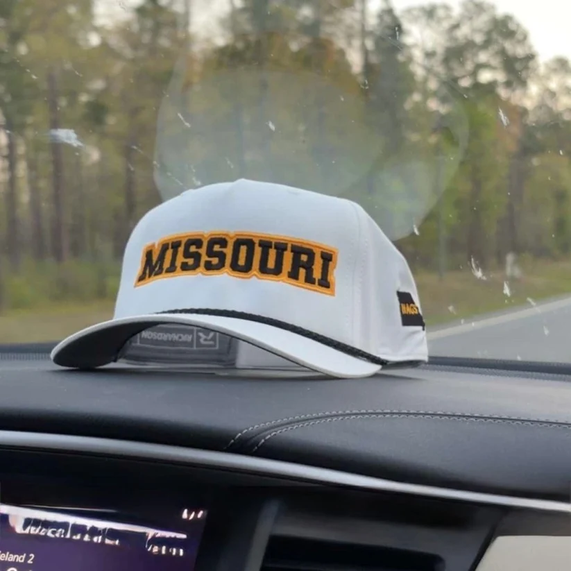 White HAGS Missouri collegiate rope hat with black and gold embroidery