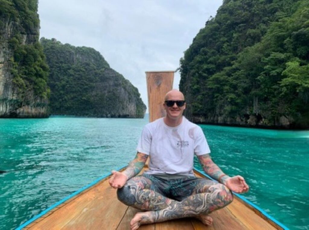 Trevor on a longtail boat in Thailand.
