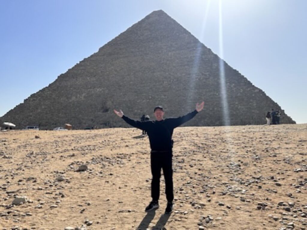 Trevor visiting the pyramids in Egypt.